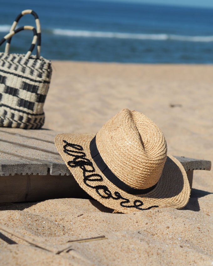 DIY embroidered beach hat how to tutorial on the beach